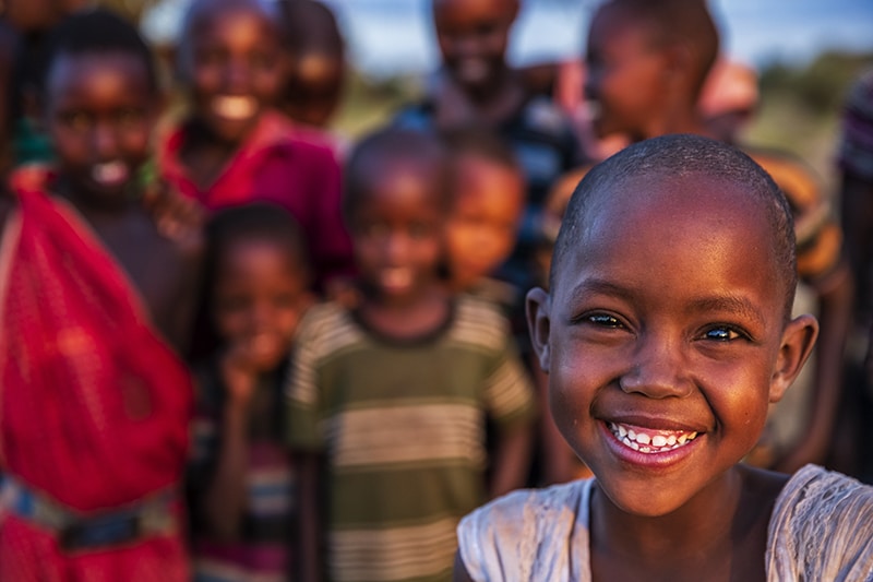 Group of happy African children from Masai tribe, Kenya, Africa. Maasai tribe inhabiting southern Kenya and northern Tanzania, and they are related to the Samburu.